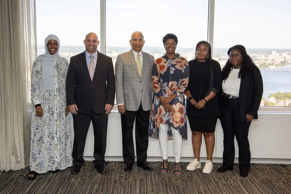 Dean Venky Venkatachalam and the participating College of Management students at the UMass Club for the BEST Boston Pilot Presentations.