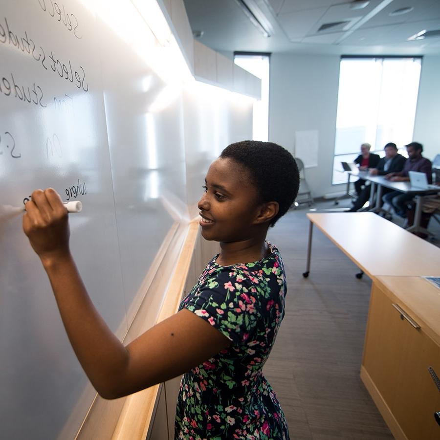 Graduate Student at Whiteboard