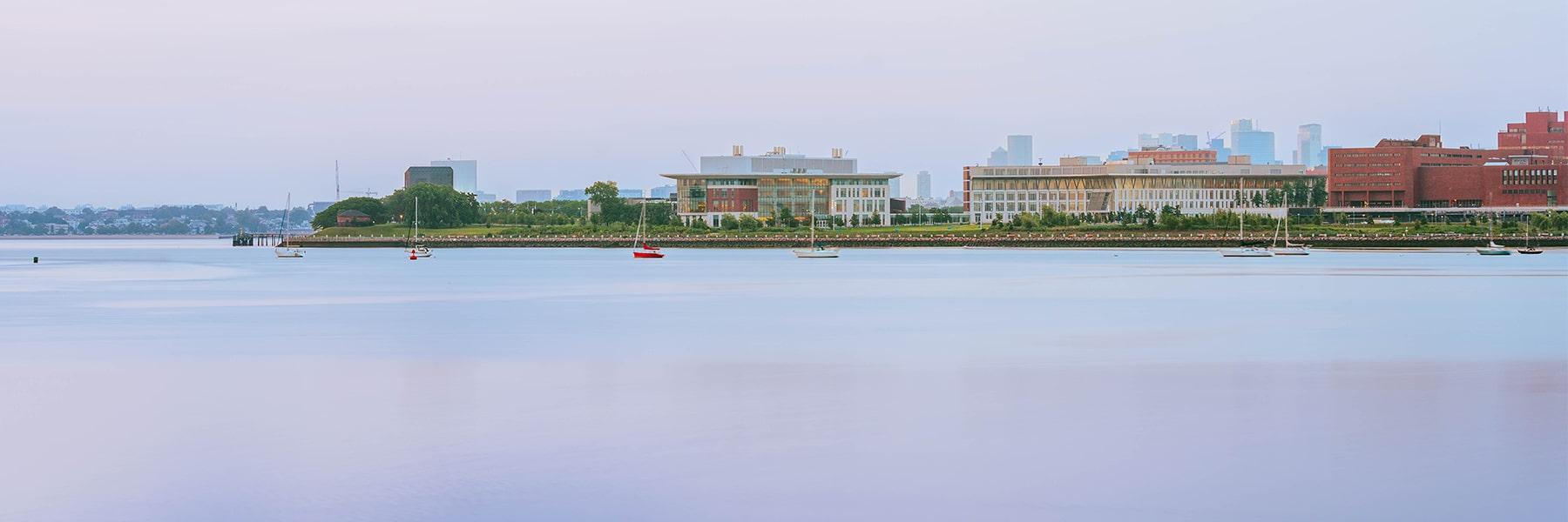 Sunset view of campus from the water